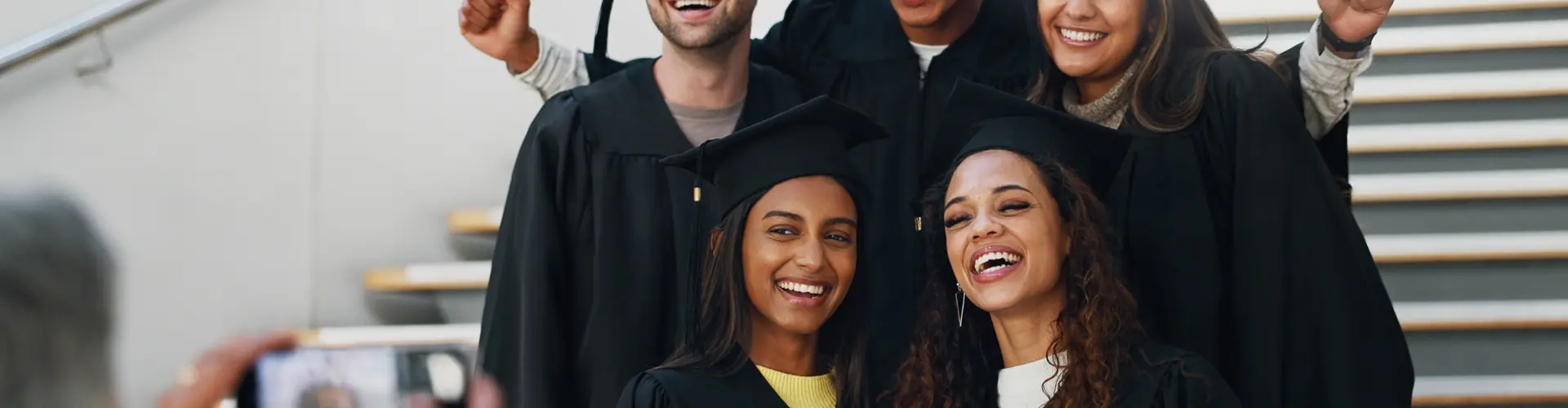 graduates celebrating