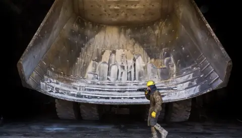 mining worker walking